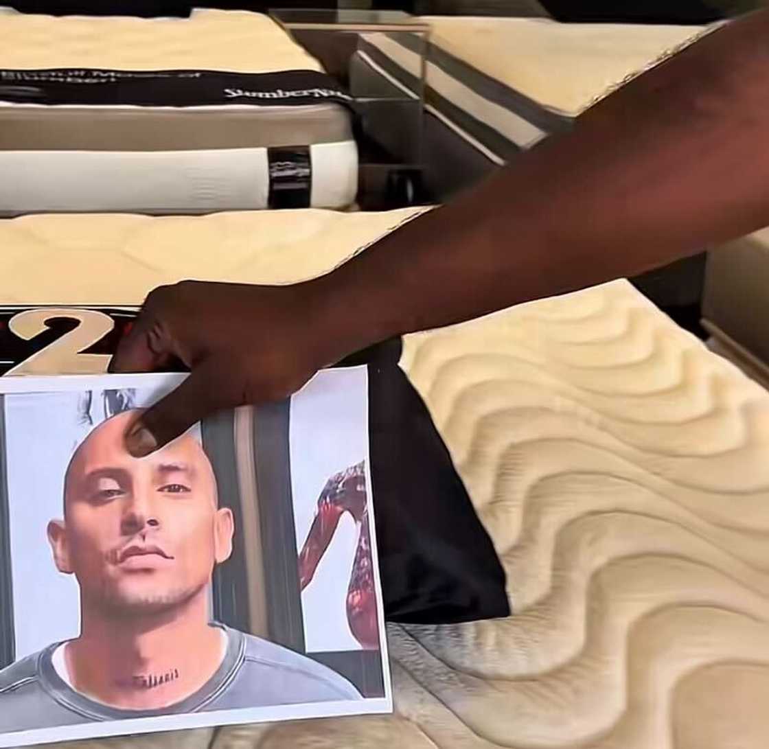 A picture of DJ Warras was placed on a bed in a store as the company used his death as part of their marketing tactics. A picture of DJ Warras was placed on a bed in a store as the company used his death as part of their marketing tactics.