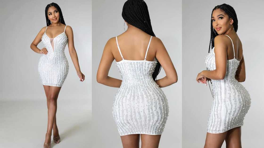 Sleeveless pearly mini with rhinestone detail Sleeveless pearly mini with rhinestone detail