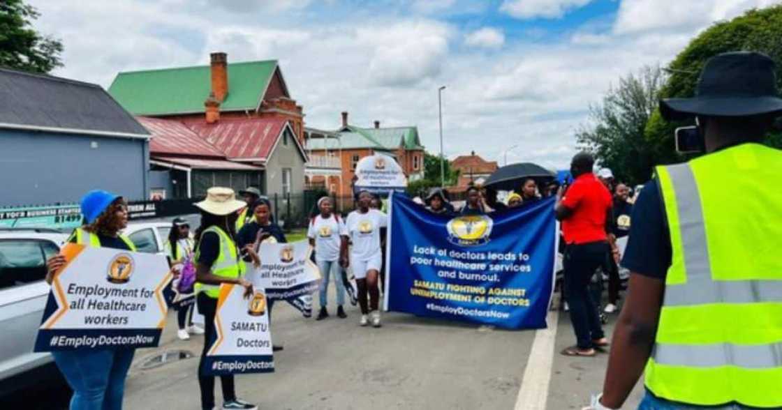 Healthcare workers march against joblessness experienced by doctors