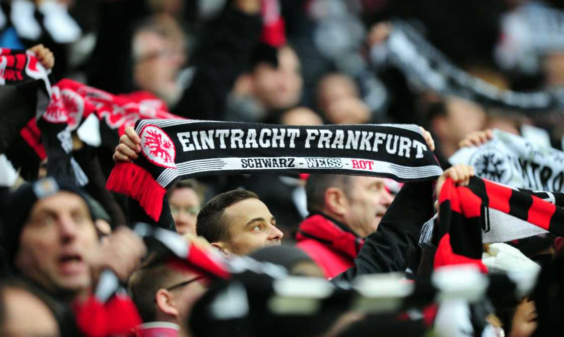 Fans of the football club Eintracht Frankfurt celebrate before the Bundesliga soccer match Fans of the football club Eintracht Frankfurt celebrate before the Bundesliga soccer match