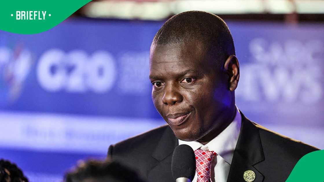 South Africa's Minister of International Relations and Cooperation, Ronald Lamola, addresses the media during the G20 Leaders' Summit plenary session at the Nasrec Expo Centre in Johannesburg on November 22, 2025