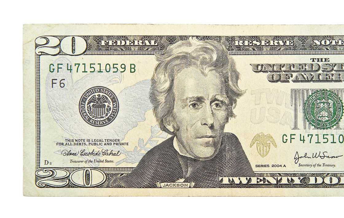 Top view of twenty dollars isolated on white background. Top view of twenty dollars isolated on white background.