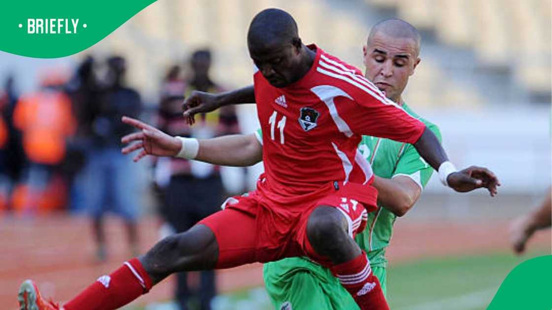 Esau Kanyenda, African Nations Cup, Malawi and Algeria. Esau Kanyenda, African Nations Cup, Malawi and Algeria.