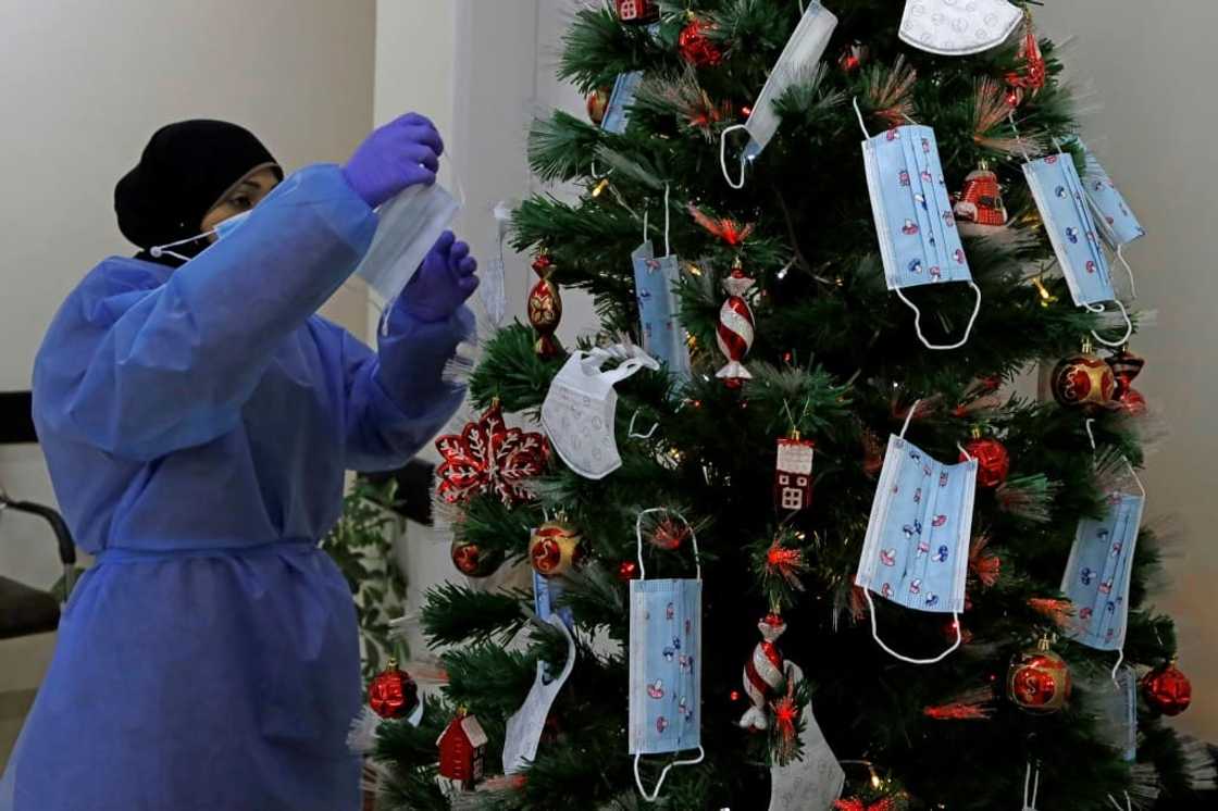 Researchers have urged people to wear masks this holiday season after finding that multiple Covid infection increases the risk of health issues Researchers have urged people to wear masks this holiday season after finding that multiple Covid infection increases the risk of health issues
