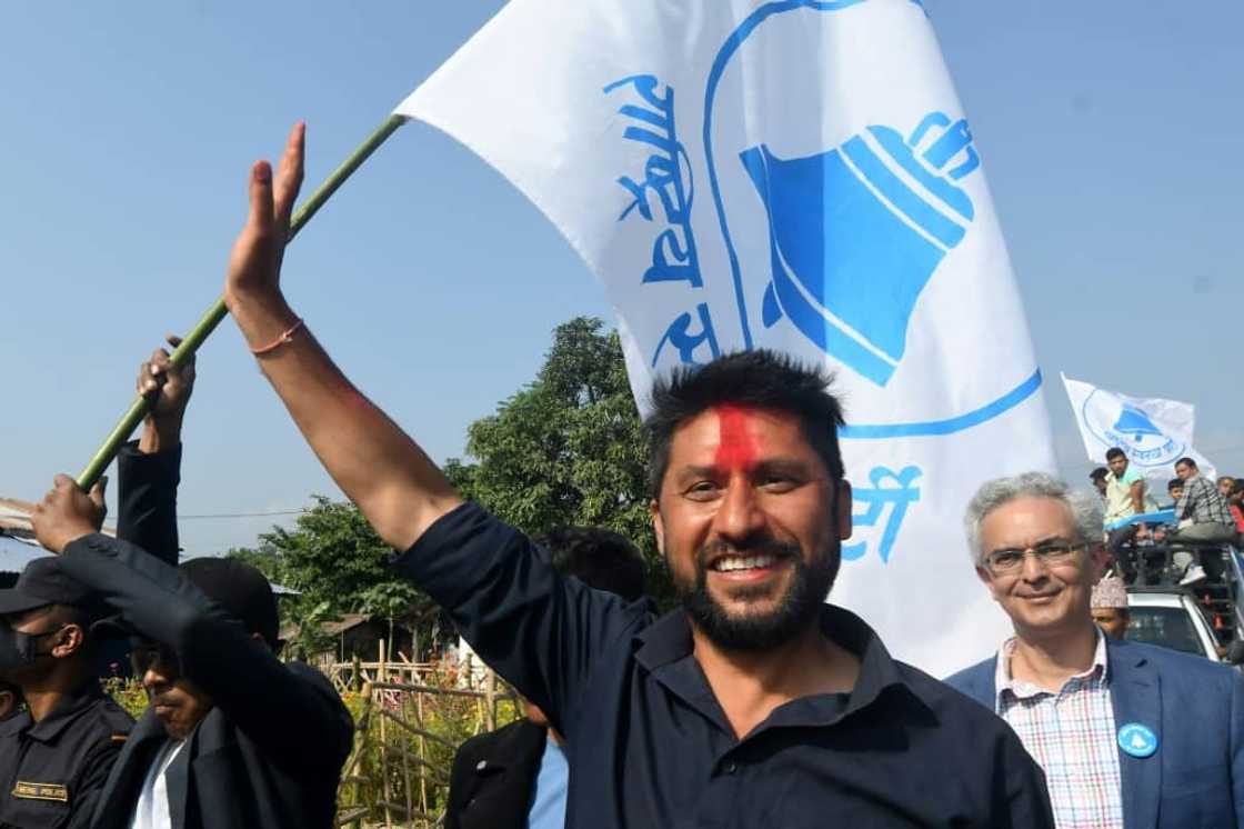 Former television host Rabi Lamichhane waves during a campaign event ahead of Nepal's general election Former television host Rabi Lamichhane waves during a campaign event ahead of Nepal's general election