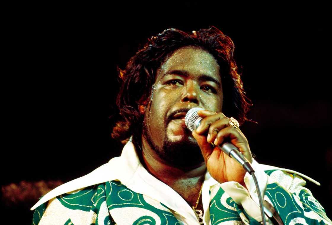 Photo of Barry White performing live onstage. Photo of Barry White performing live onstage.