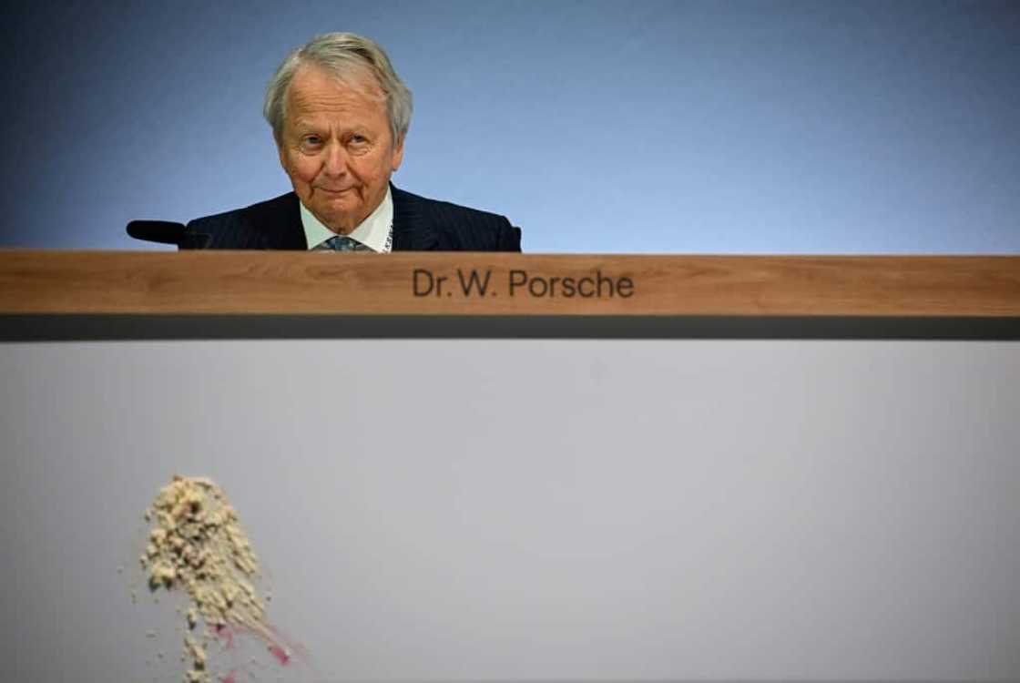 Cake was thrown at Wolfgang Porsche, board member of German car giant Volkswagen, at a shareholder meeting