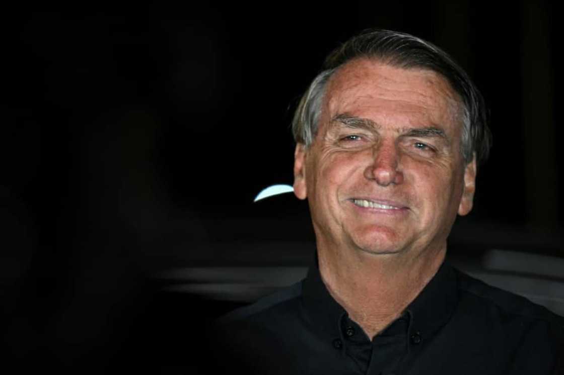 Brazilian President and re-election candidate Jair Bolsonaro makes an appearance after learning he has made it into a runoff election October 30 Brazilian President and re-election candidate Jair Bolsonaro makes an appearance after learning he has made it into a runoff election October 30