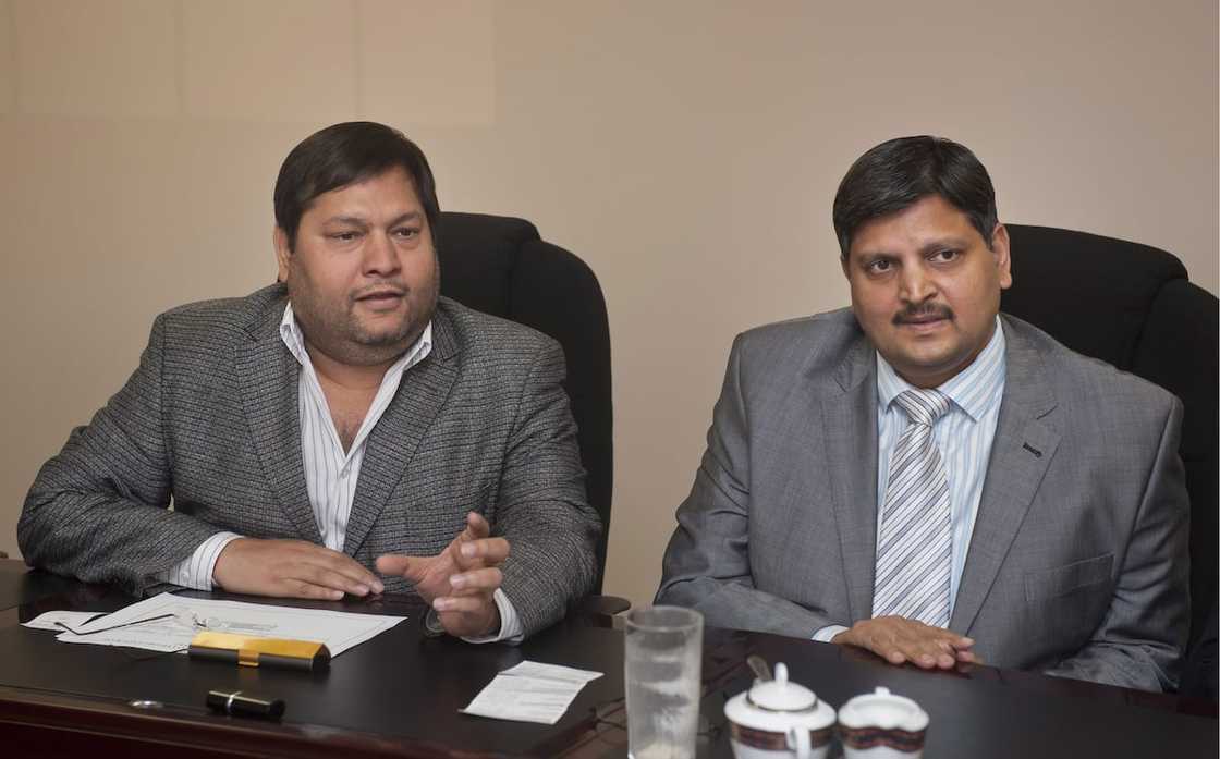 Ajay Gupta (R) and Atul Gupta (L)