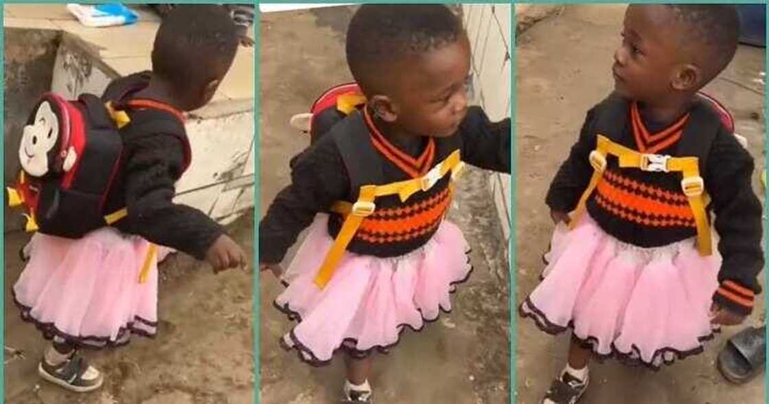 Little boy comes back home from school in a skirt Little boy comes back home from school in a skirt