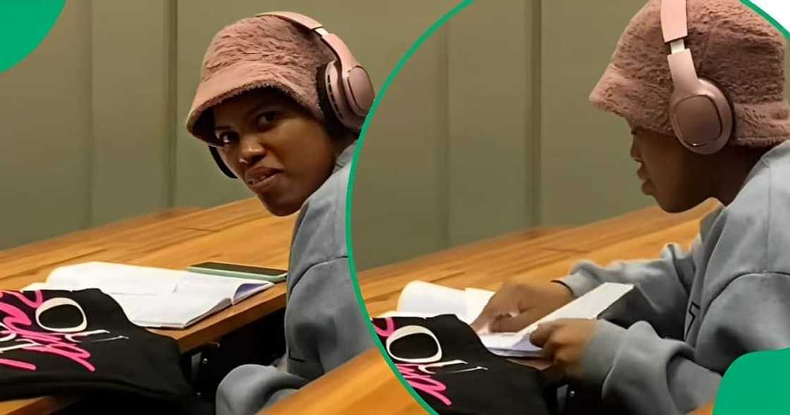 A TikTok video shows a student with paper in a classroom. A TikTok video shows a student with paper in a classroom.