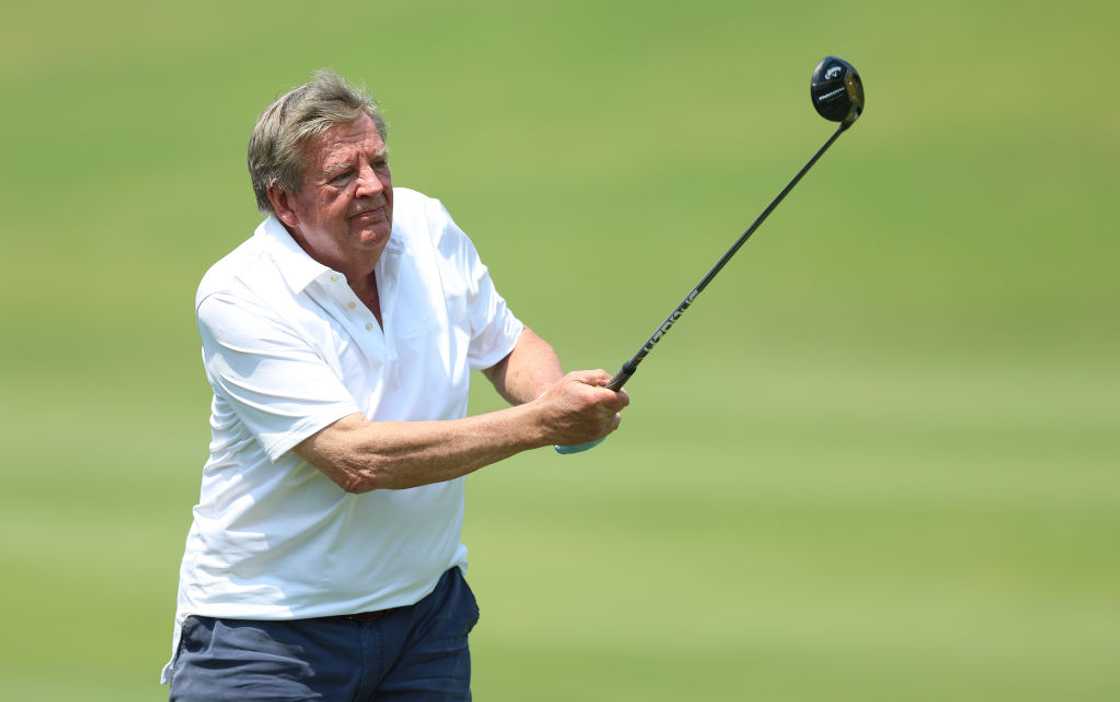 Johann Rupert, the CEO and Chairman of The Richemont Group plays a shot prior to the Alfred Dunhill Championship at Leopard Creek Country Club on December 05, 2023 in Malelane