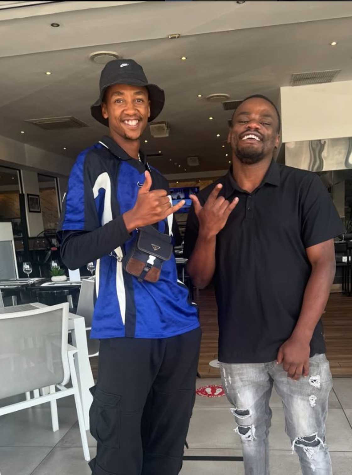 Scotts Maphuma later posed with fans Scotts Maphuma later posed with fans