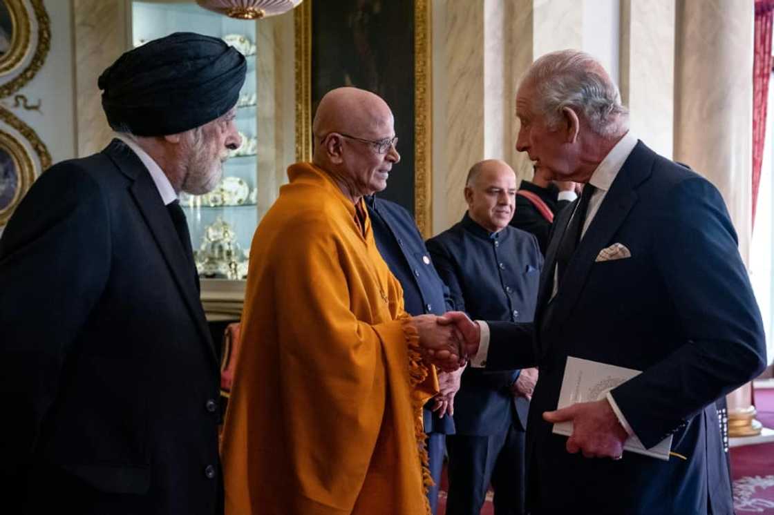 King Charles III (R) has described Britain as a 'community of communities' King Charles III (R) has described Britain as a 'community of communities'