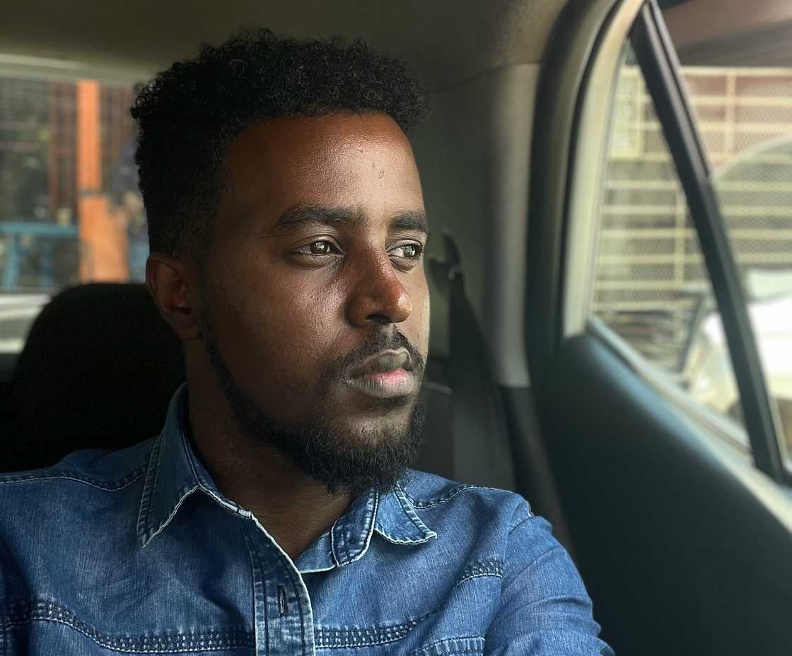 A stressed man in a car