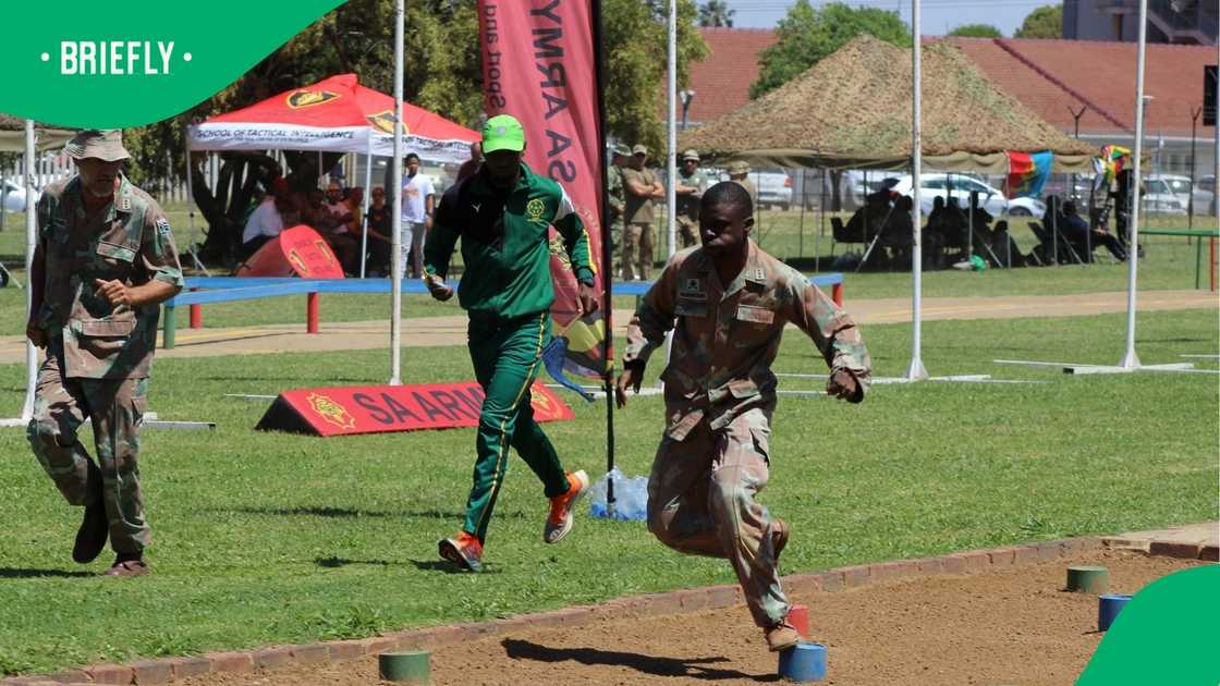 South African Army member taking on an obstacle course.