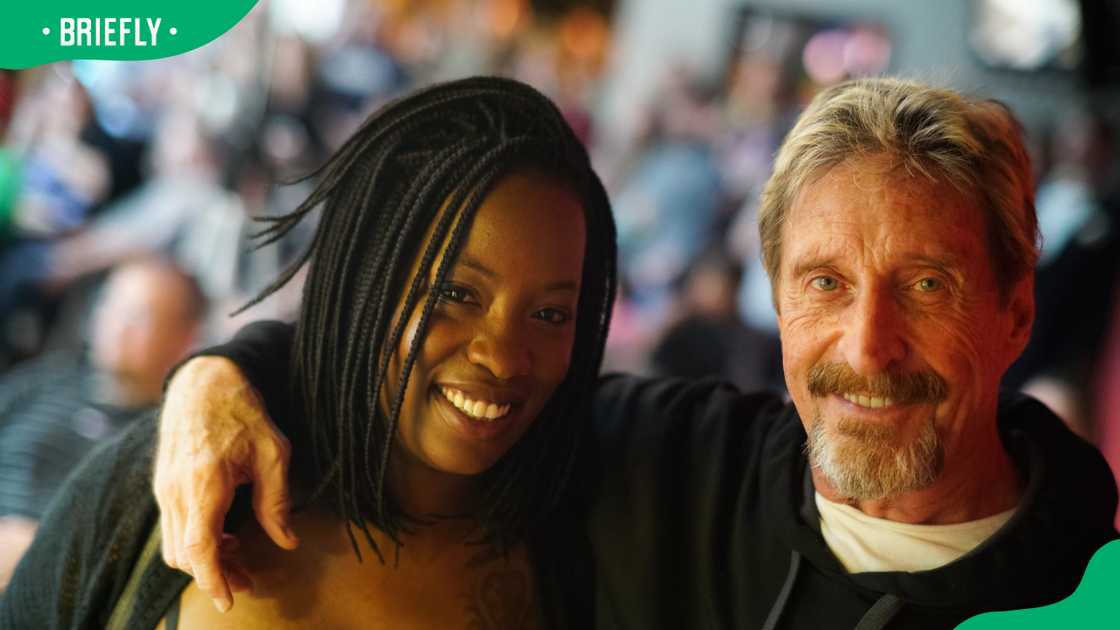 John McAfee and wife Janice Dyson having a good time John McAfee and wife Janice Dyson having a good time