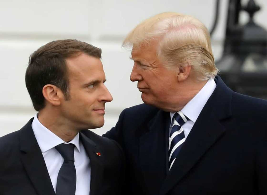 Macron tried to woo Biden's predecessor Donald Trump (R) early in his term