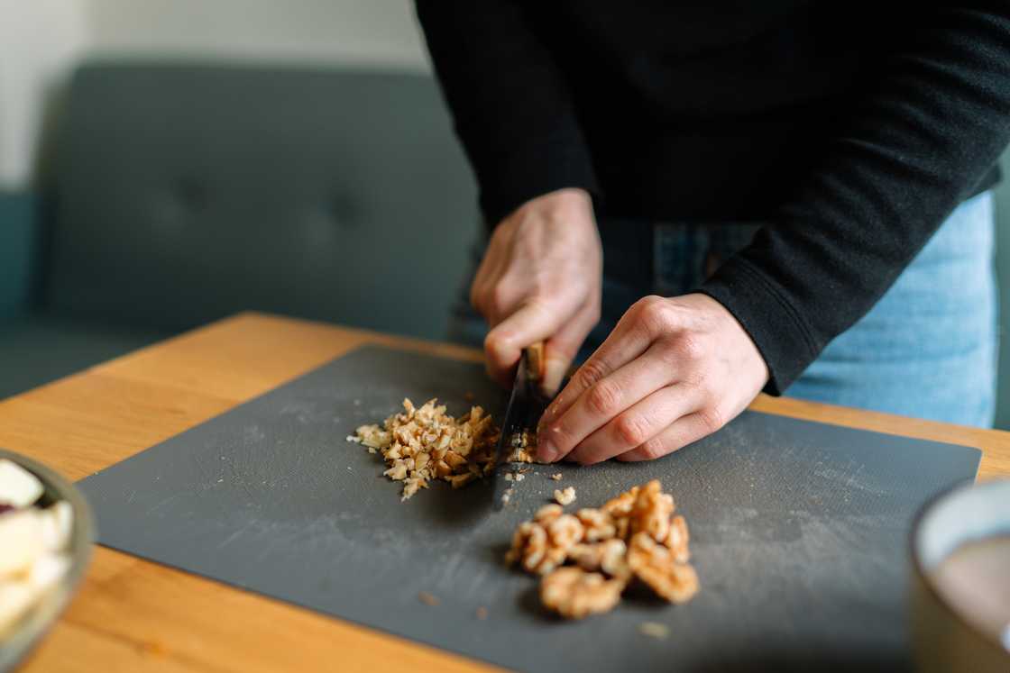 Chopped pecans on a board