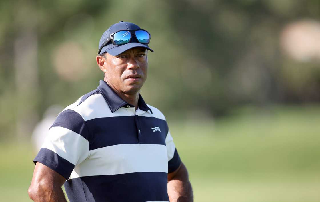 Tiger Woods watches his son Charlie Woods play during the first round of the U.S. Junior Amateur at Brook Hollow Golf Club in Dallas
