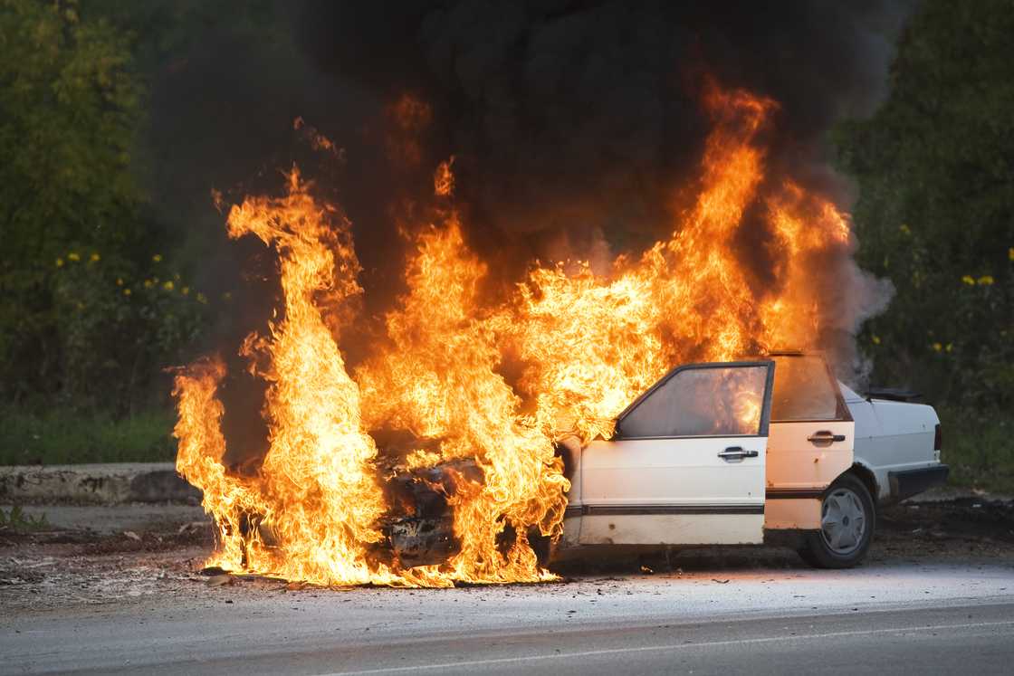 A stock photo of a burning vehicle A stock photo of a burning vehicle