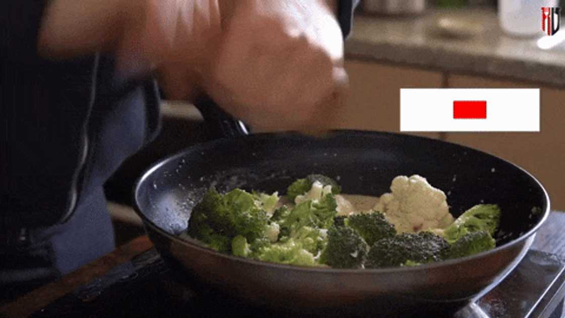 Preparing creamy veggie bake with cheese