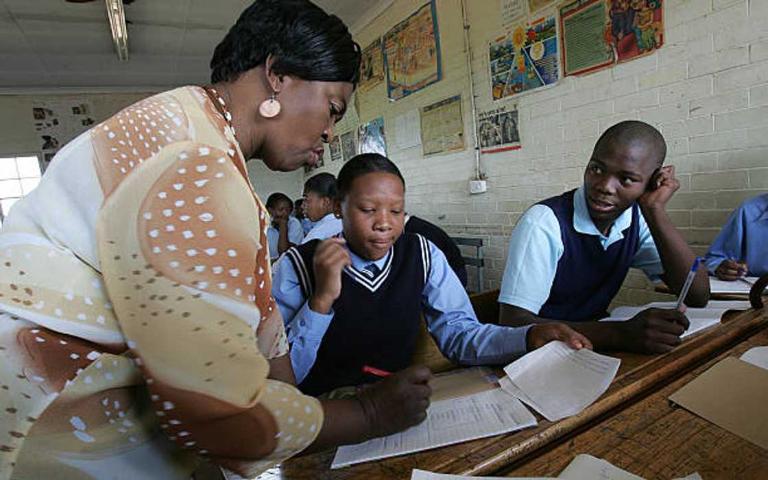 A teacher educating students at Ibhongo High School in Soweto.