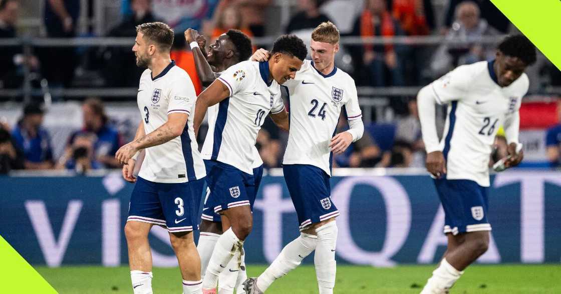 Ollie Watkins celebrates with Cole Palmer after scoring against Netherlands