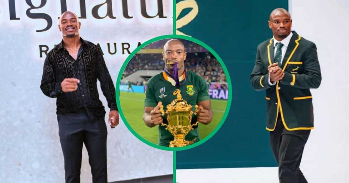 Makazole Mapimpi holds the coveted Web Ellis Trophy. Makazole Mapimpi holds the coveted Web Ellis Trophy.