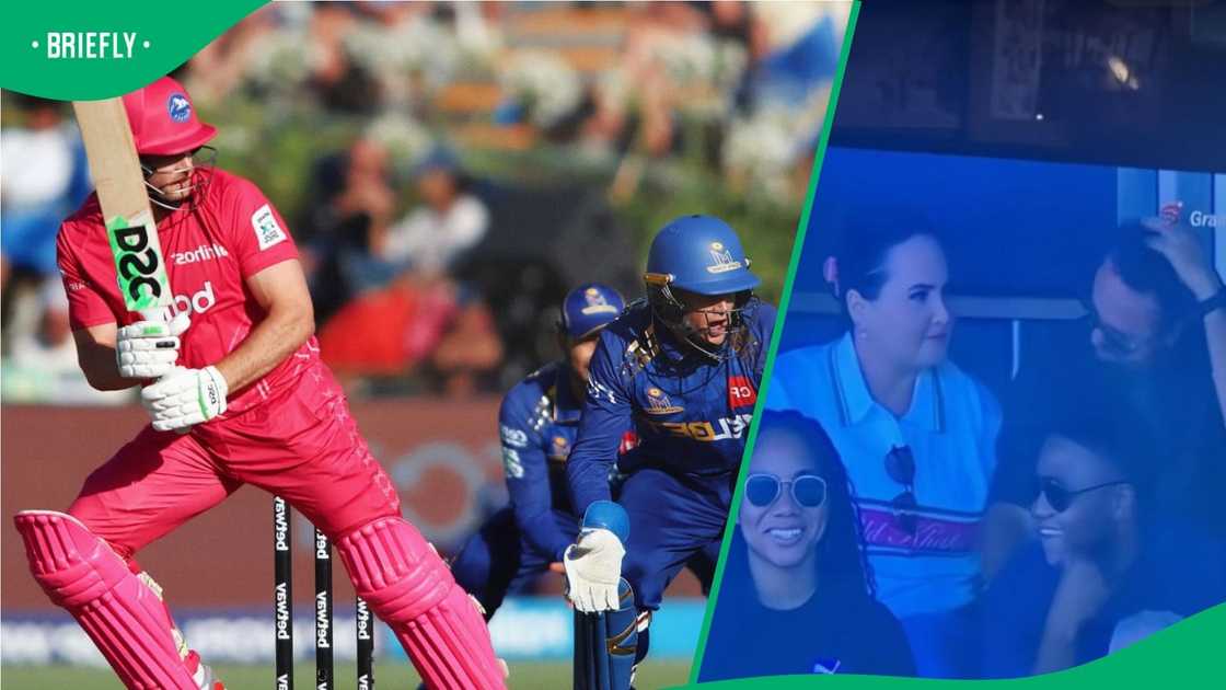 A couple was caught on the big screen at a cricket match. A couple was caught on the big screen at a cricket match.