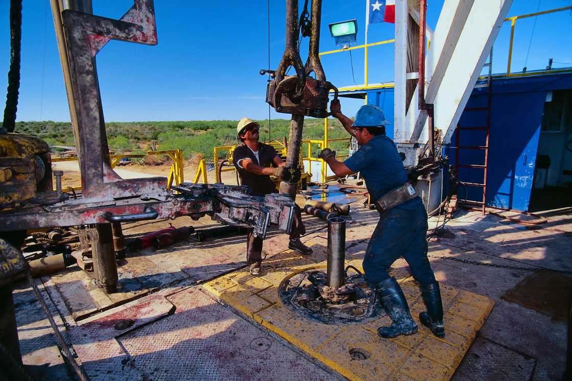Oil rig employees on the site Oil rig employees on the site