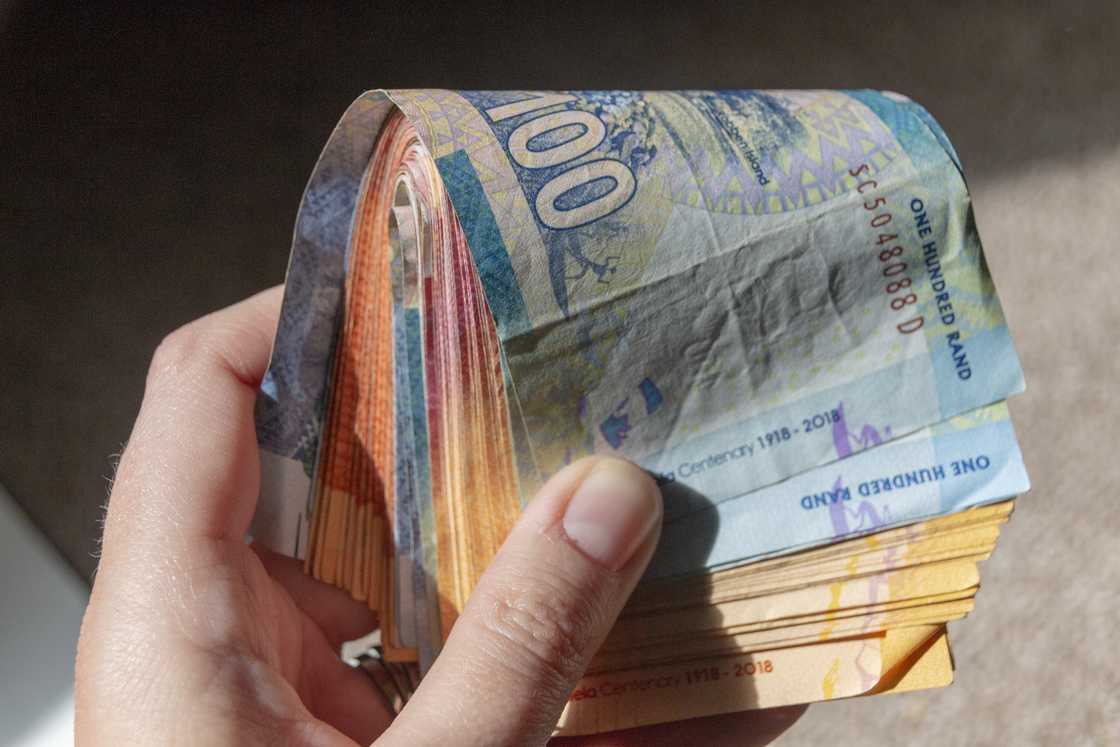A stack of South African money. A stack of South African money.