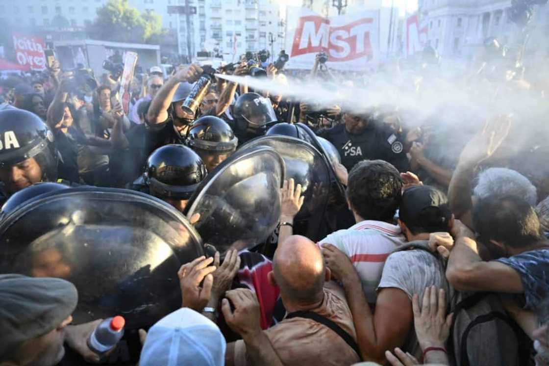 Argentine police spray tear gas at protesters outside Congress as lawmakers debate President Javier Milei's reform package Argentine police spray tear gas at protesters outside Congress as lawmakers debate President Javier Milei's reform package