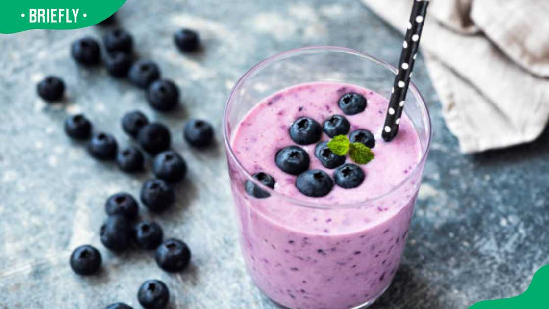 Tasty blueberry smoothie in glass Tasty blueberry smoothie in glass
