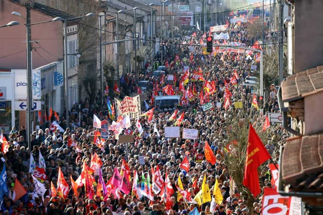 The ceremony at the Elysee palace happened on a day of massive anti-government protests The ceremony at the Elysee palace happened on a day of massive anti-government protests