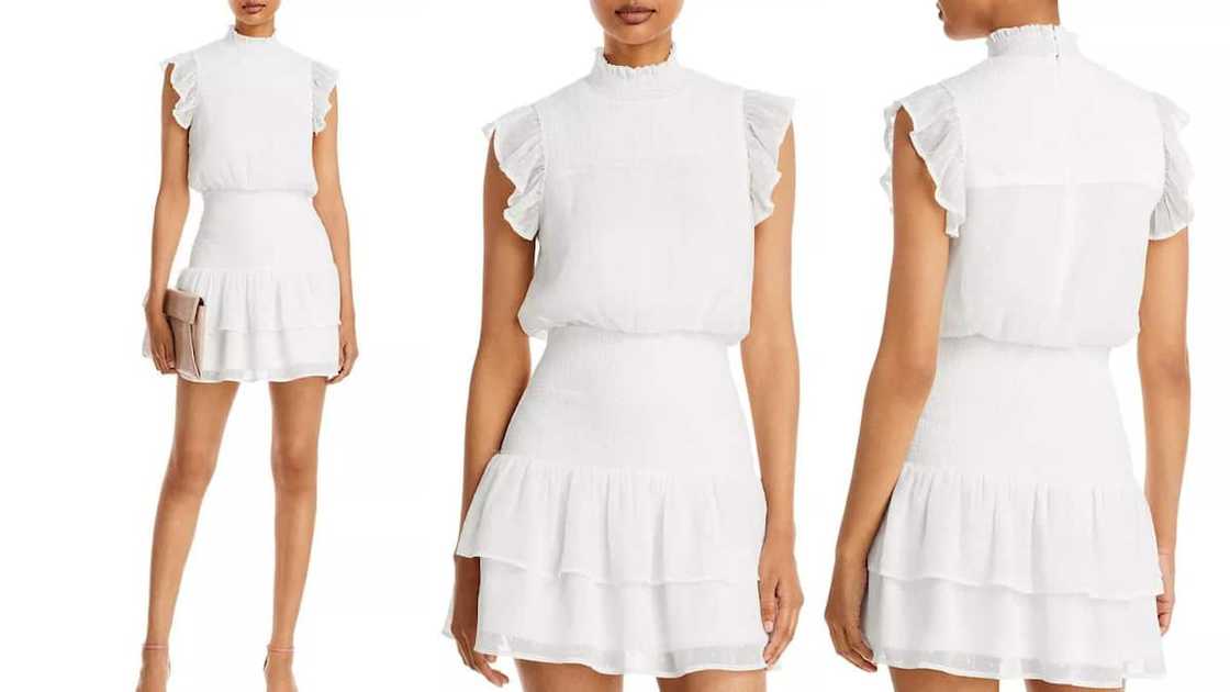 Elegant smocked mini with short sleeves and mock turtleneck Elegant smocked mini with short sleeves and mock turtleneck