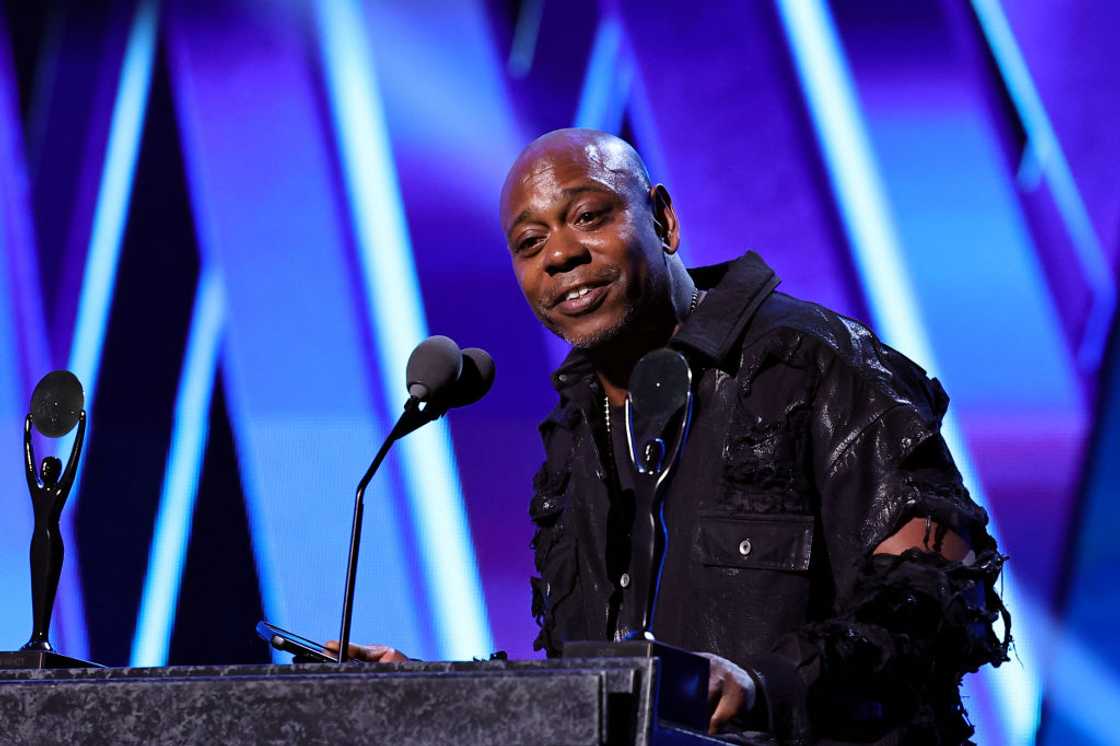 Dave Chappelle speaks onstage during the 2024 Rock & Roll Hall Of Fame Induction Ceremony Dave Chappelle speaks onstage during the 2024 Rock & Roll Hall Of Fame Induction Ceremony