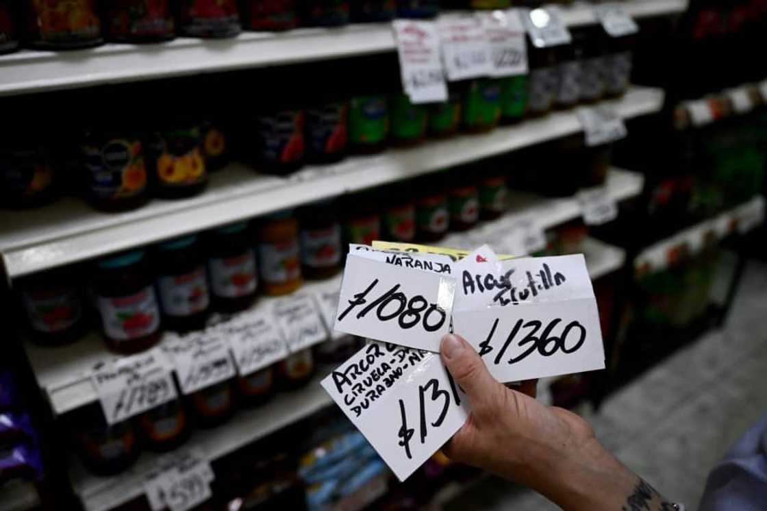 Annual inflation is already at 143 percent, and prices have risen further after the outgoing government this week eased price controls on basic goods Annual inflation is already at 143 percent, and prices have risen further after the outgoing government this week eased price controls on basic goods