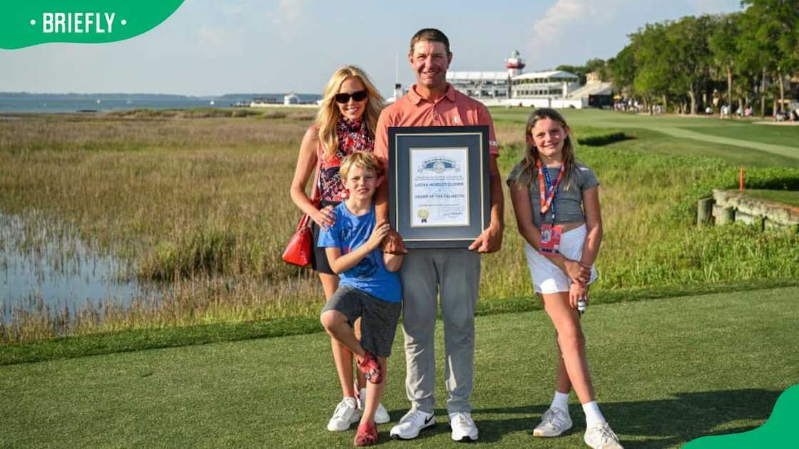 Lucas Glover, his wife Krista, and their kids Lucille and Lucas Jr. posing for a photo at Harbour Town Golf Links in 2024
