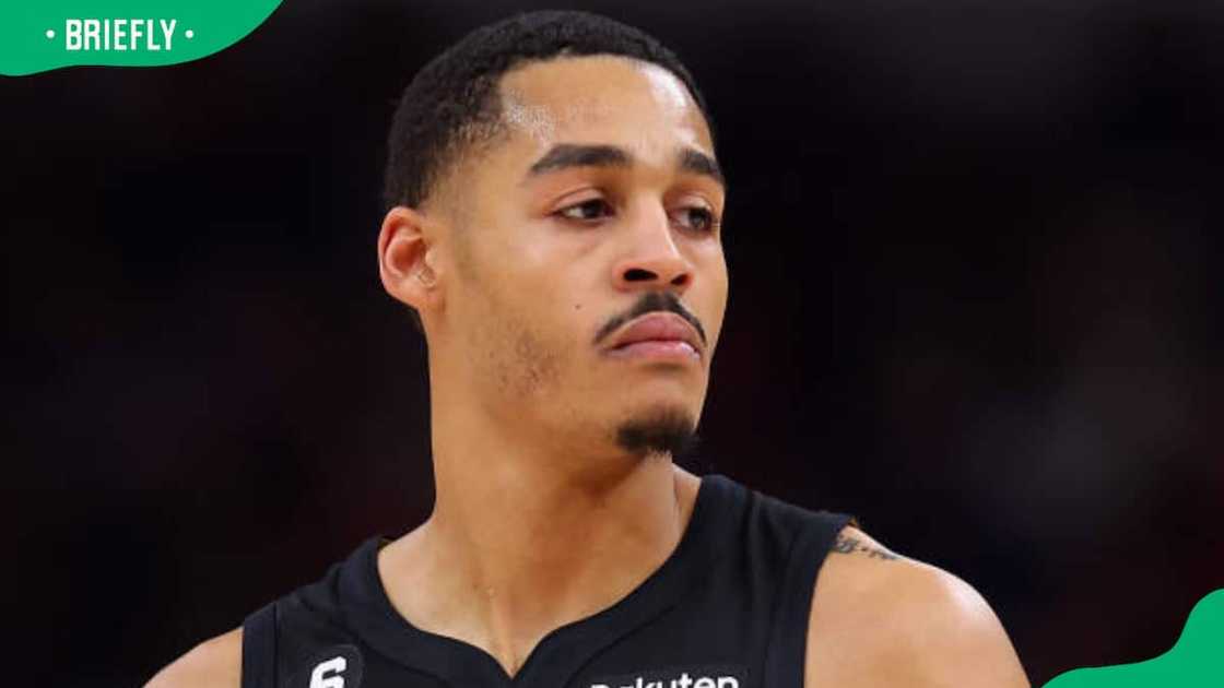 Jordan Poole looks on against the Chicago Bulls Jordan Poole looks on against the Chicago Bulls