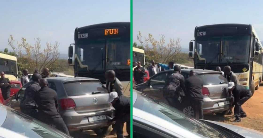 Men remove a Polo out of the way Men remove a Polo out of the way