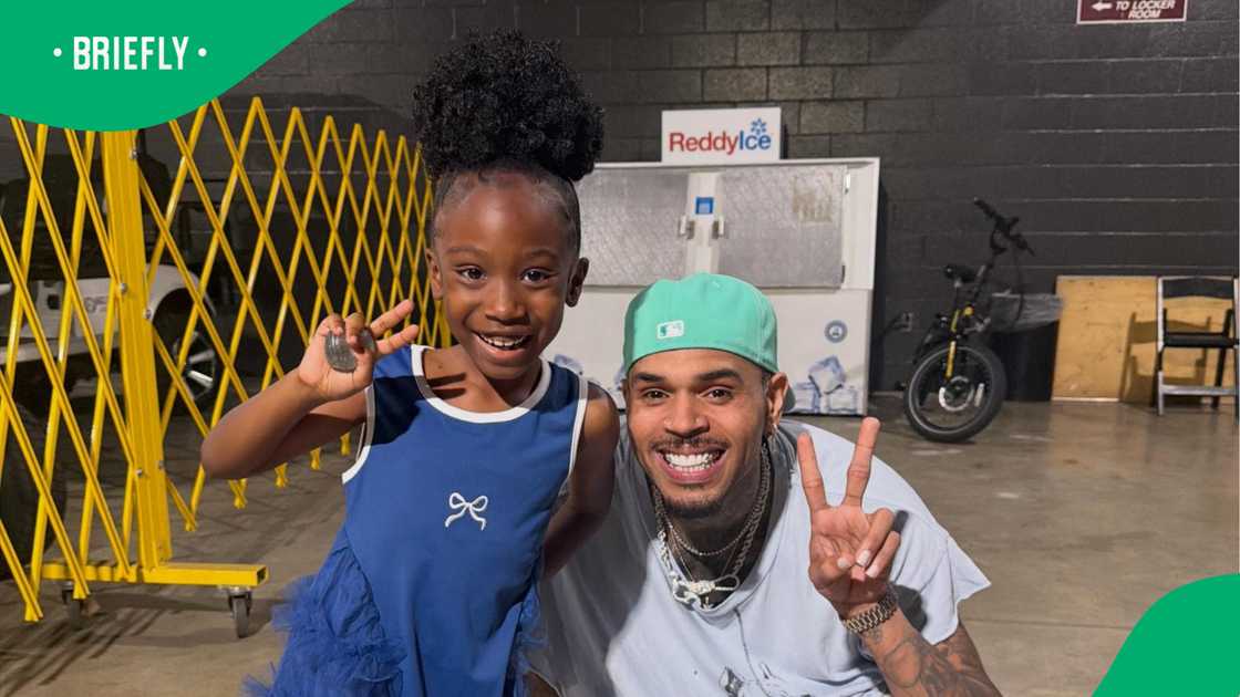 Chris Brown meets the young fan after her impressive freestyle. Chris Brown meets the young fan after her impressive freestyle.