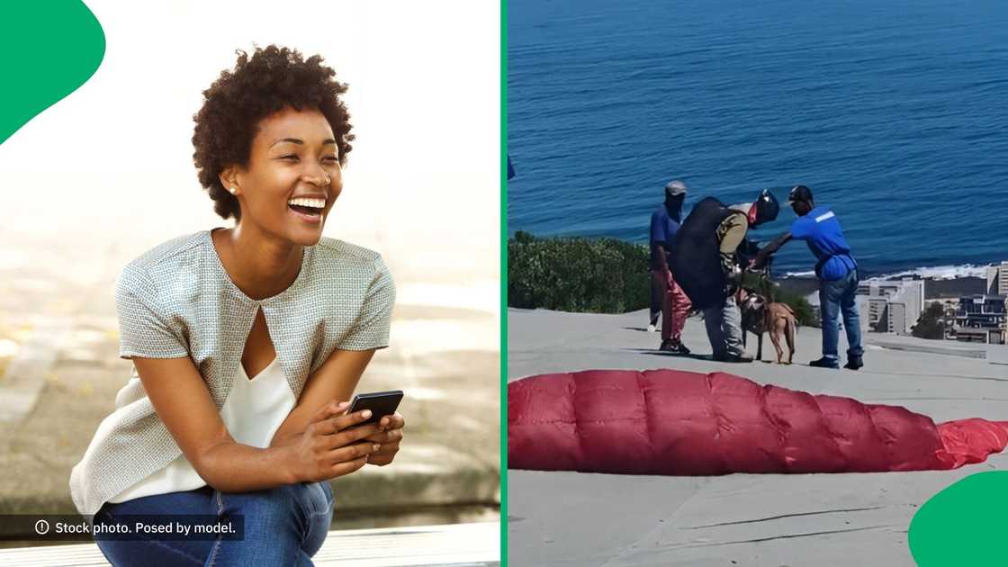 People laughed at a man paragliding with his dog. People laughed at a man paragliding with his dog.