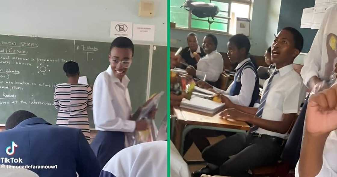 A high school pupil handed out snacks in the classroom