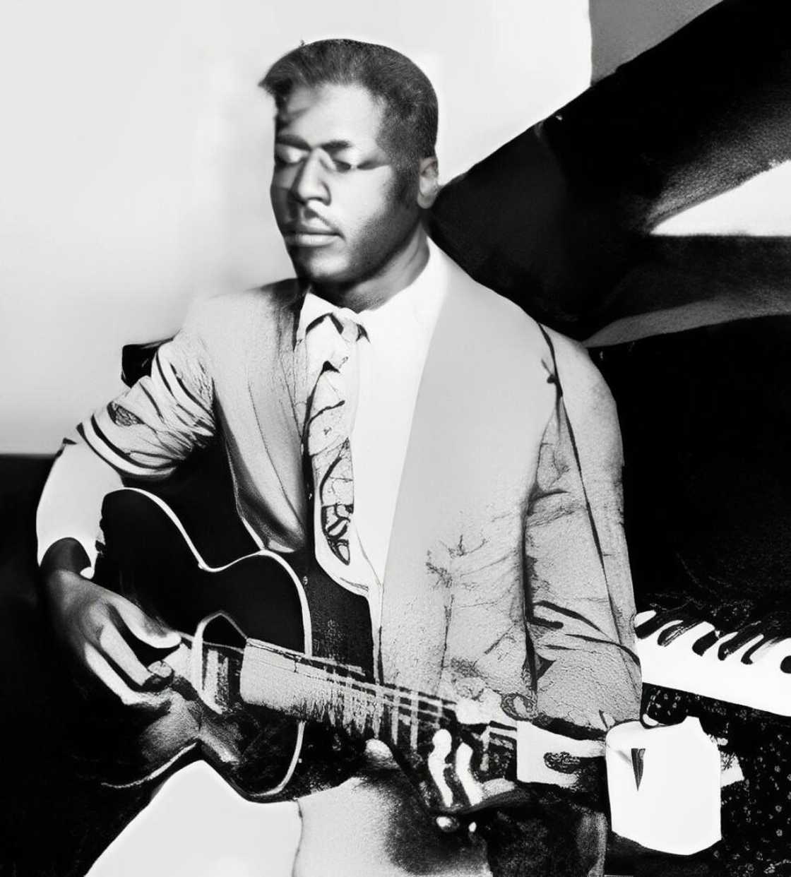 Blues guitarist Blind Willie Johnson poses for a portrait circa 1927