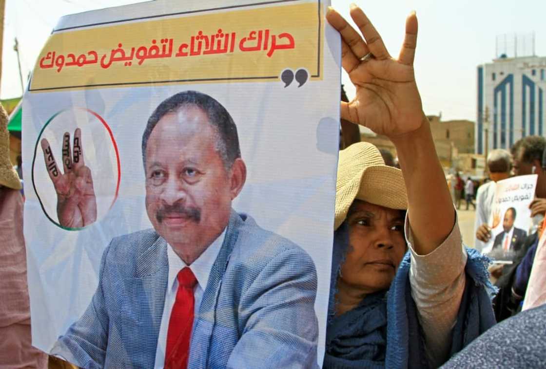 Sudanese protesters supported the reinstatement of Abdalla Hamdok, the premier ousted in the October 2021 military coup, during a demonstration in southern Khartoum on July 26, 2022 Sudanese protesters supported the reinstatement of Abdalla Hamdok, the premier ousted in the October 2021 military coup, during a demonstration in southern Khartoum on July 26, 2022