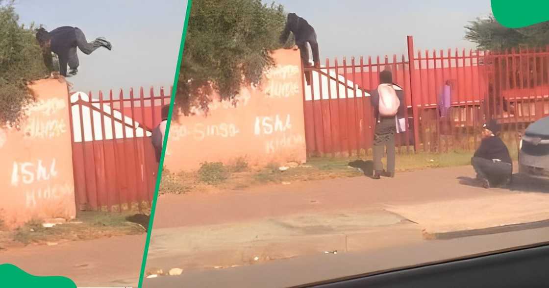 A girl was filmed jumping over her school's fence. A girl was filmed jumping over her school's fence.