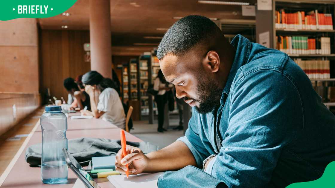 A student in the library A student in the library