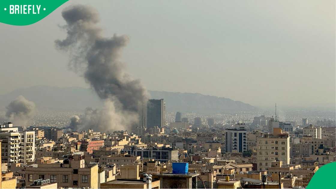Plumes of smoke rise following reported explosions in Tehran
