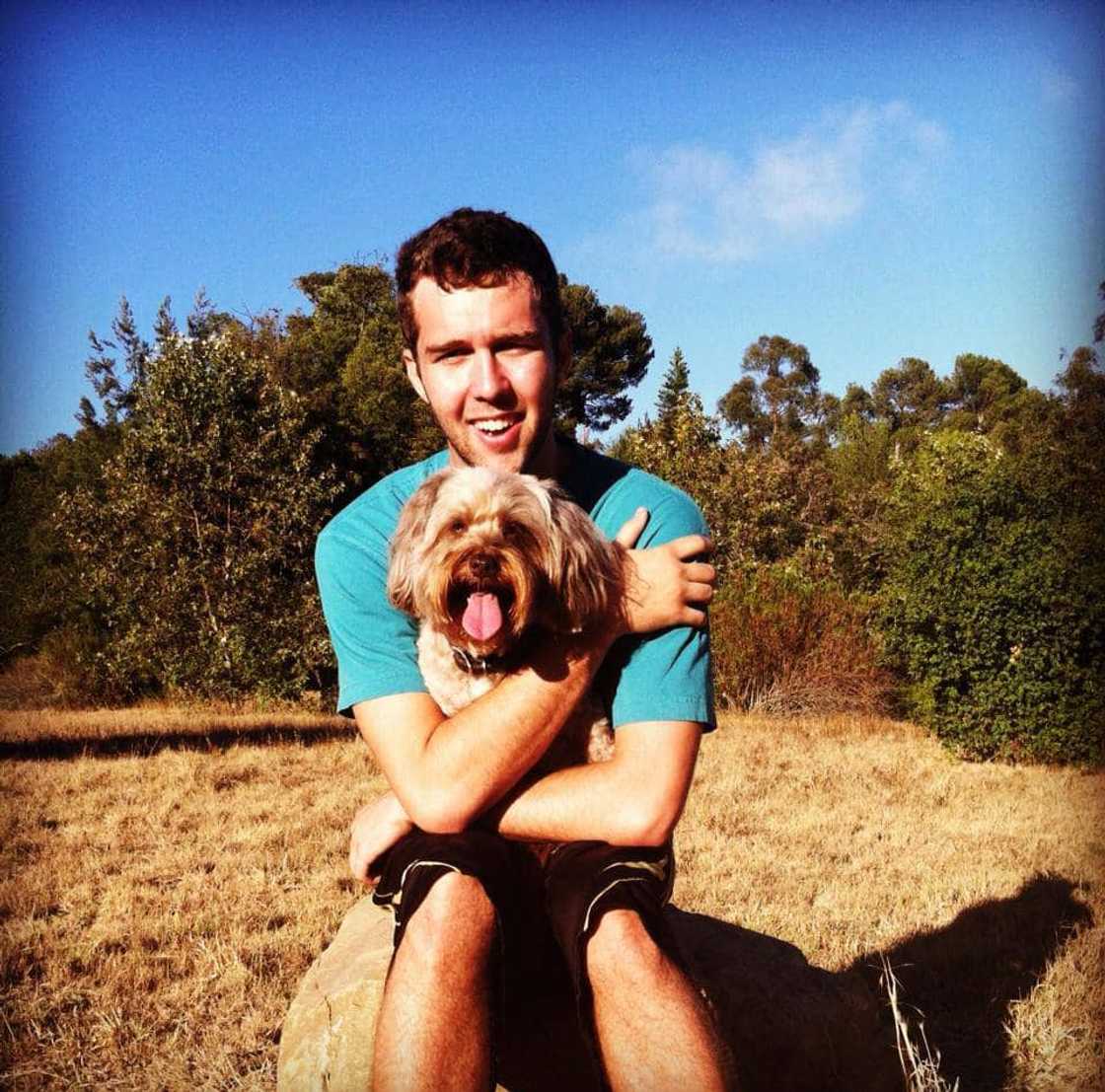 Dylan Macdonald with his pet dog. Dylan Macdonald with his pet dog.